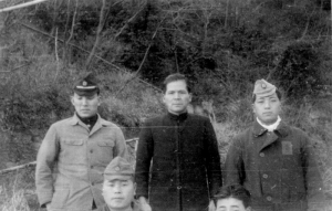 The Japanese signalmen, photo taken by someone with bad aim. The man in black was the captain of the oil tanker mentioned earlier.